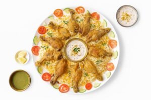 Chicken biryani platter from the Theiven Cafe menu